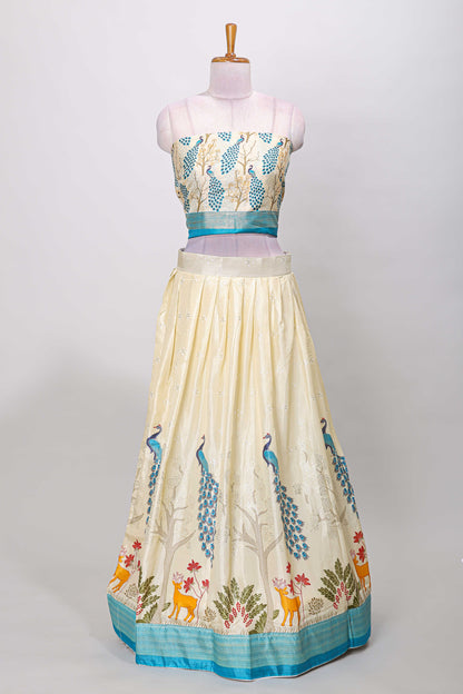 Cream dola silk peacock and floral printed lehenga with contrast border and dhavani