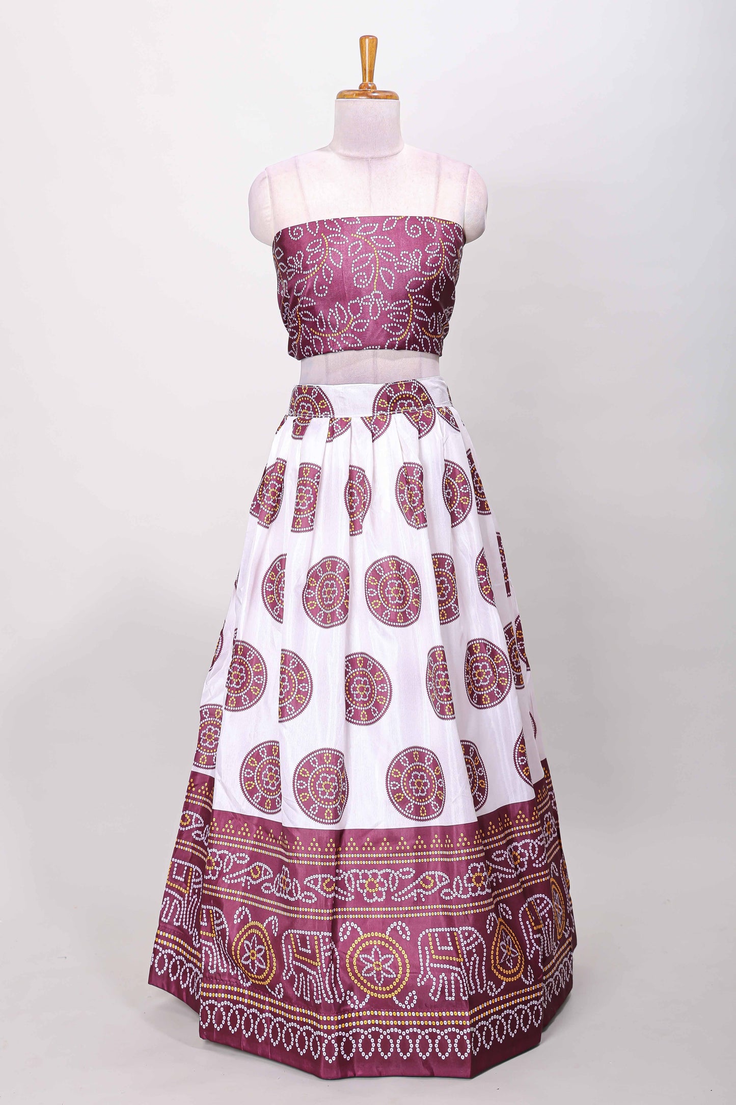 Maroon dola silk bhandani elephant and floral printed lehenga with contrast blouse and dhavani