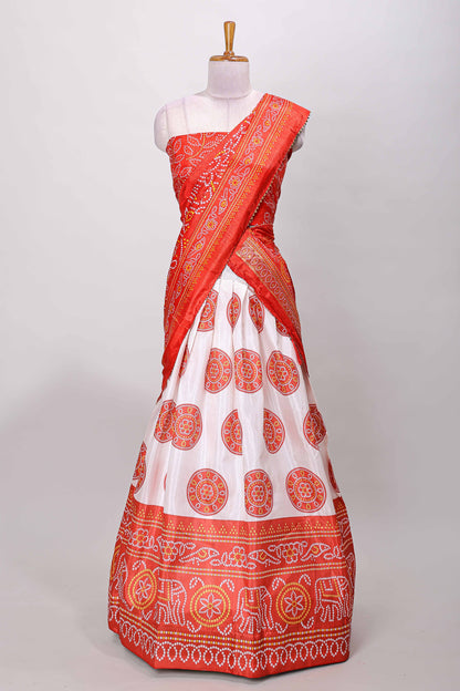 Red dola silk bhandani elephant and floral printed lehenga with contrast blouse and dhavani