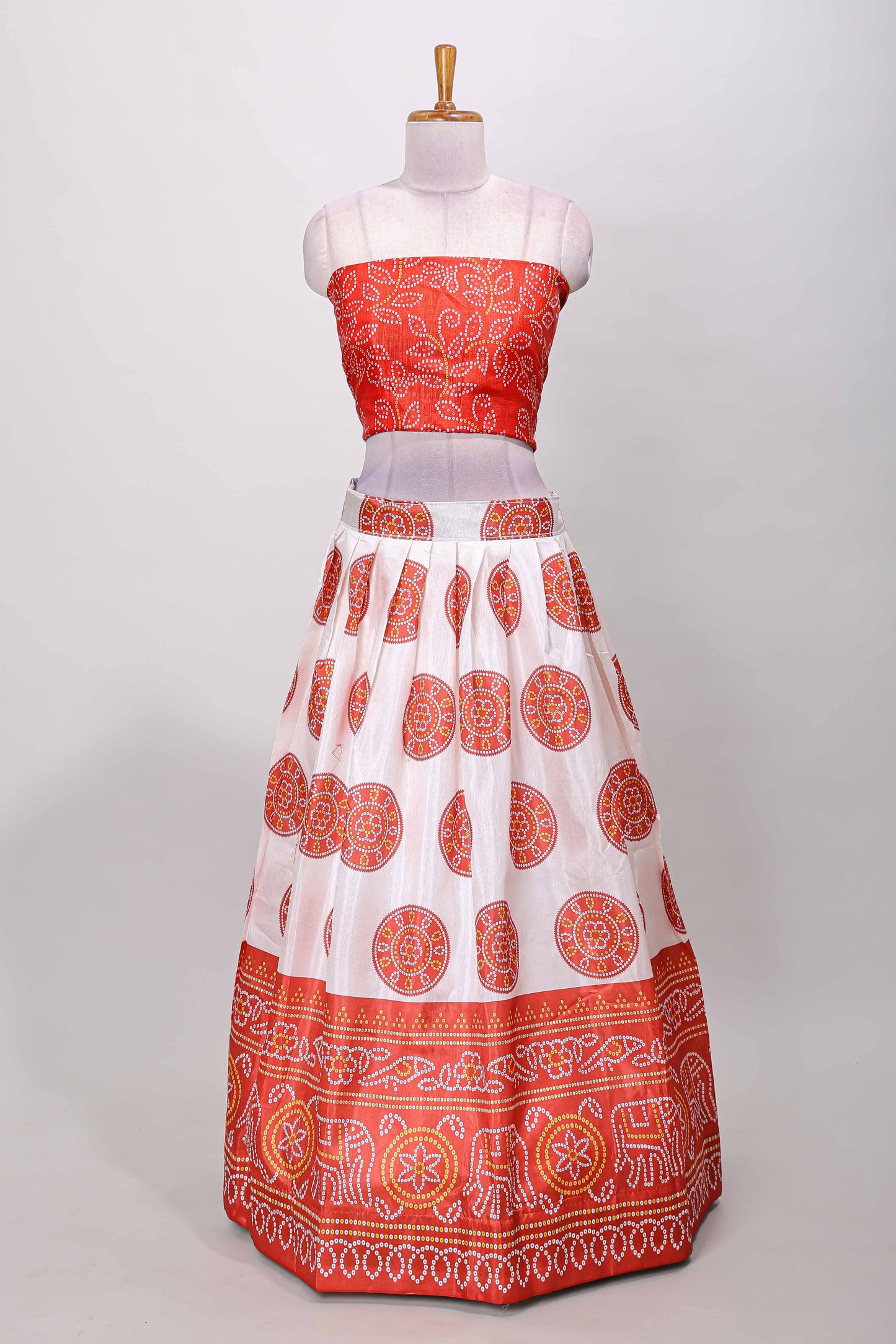 Red dola silk bhandani elephant and floral printed lehenga with contrast blouse and dhavani