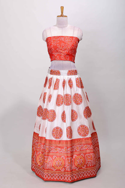 Red dola silk bhandani elephant and floral printed lehenga with contrast blouse and dhavani
