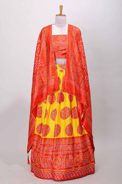 Yellow dola silk bhandani elephant and floral printed lehenga with contrast blouse and dhavani