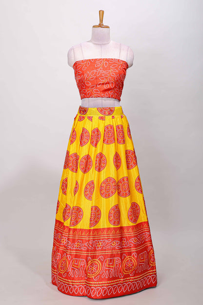 Yellow dola silk bhandani elephant and floral printed lehenga with contrast blouse and dhavani
