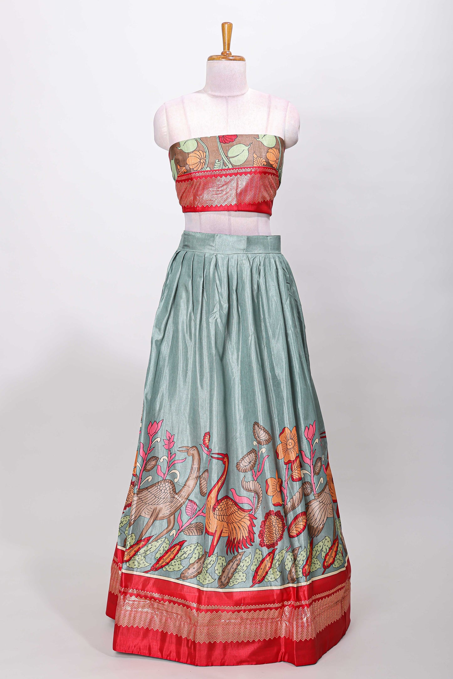 Turquoise blue dola silk birds and floral printed lehenga with contrast blouse and dhavani