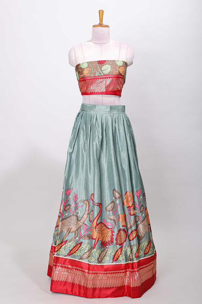 Turquoise blue dola silk birds and floral printed lehenga with contrast blouse and dhavani
