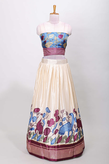 Cream dola silk birds and floral printed lehenga with contrast blouse and dhavani