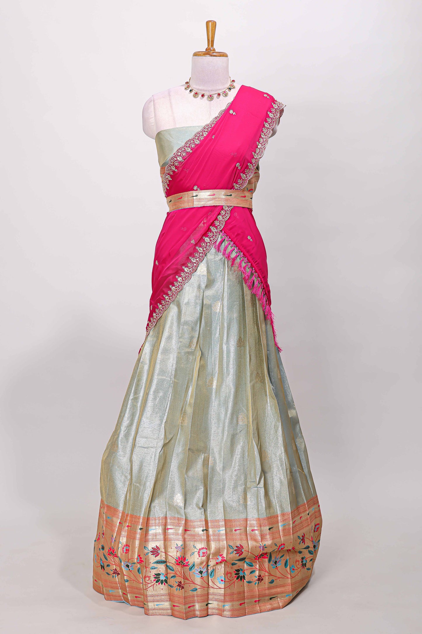 Blue tissue lehenga with floral vines butta design and contrast border dhavani