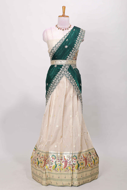Cream cotton lehenga with floral vines zari butta design and green border dhavani