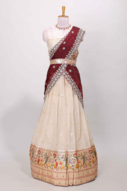 Cream cotton lehenga with floral vines zari butta design and maroon border dhavani