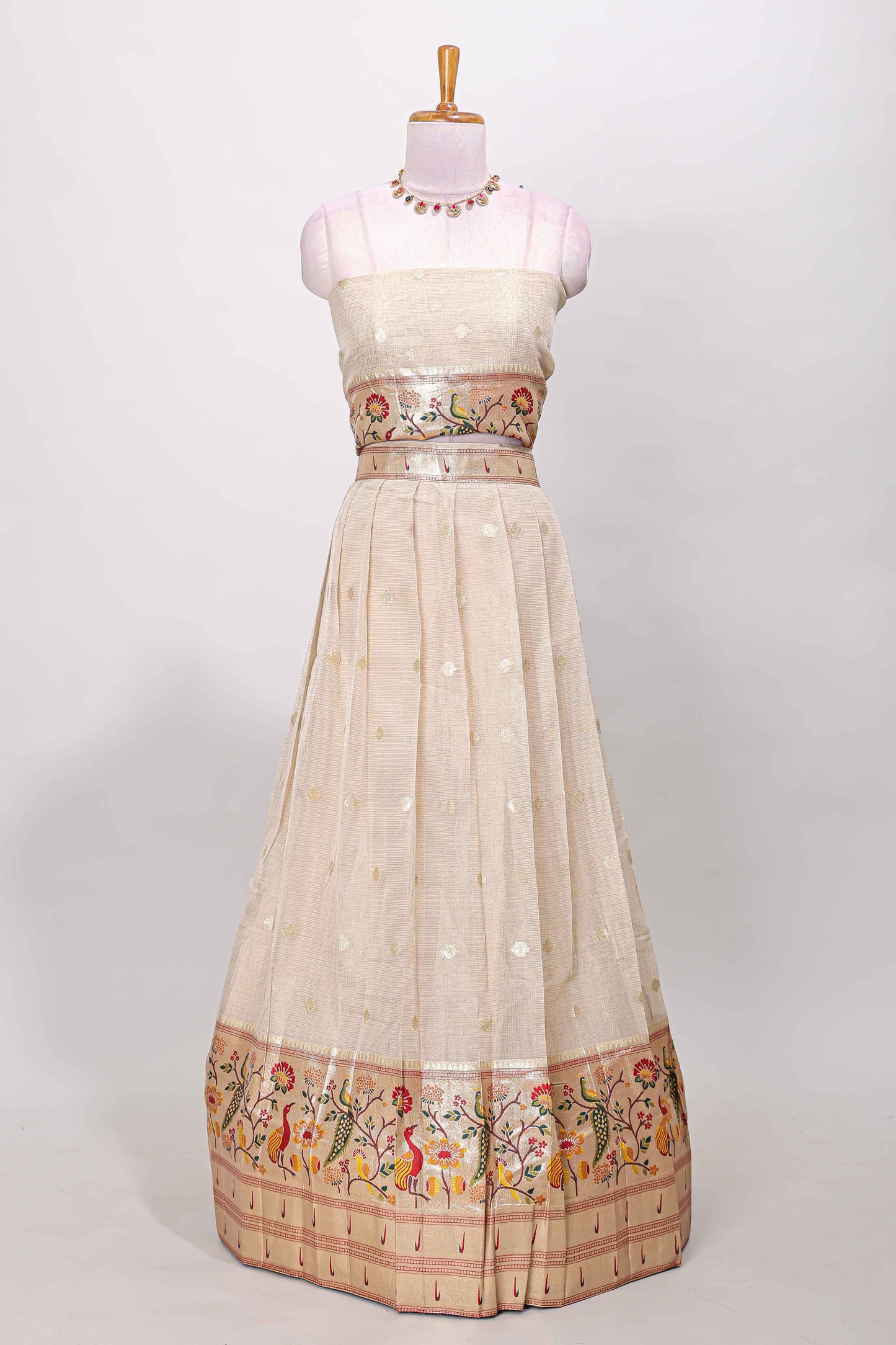 Cream cotton lehenga with floral vines zari butta design and maroon border dhavani