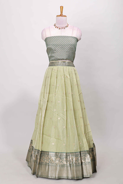 Green kota cotton lehenga featuring a textured body with zari butta, finished with a contrast border and matching dhavani