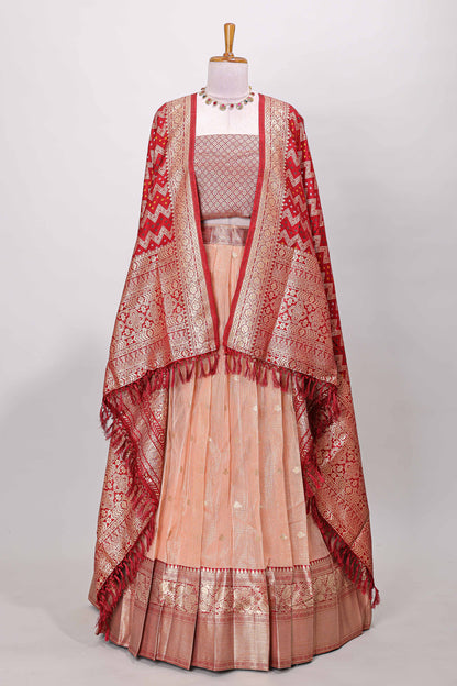 Orange kota cotton lehenga featuring a textured body with zari butta, finished with a contrast border and matching dhavani