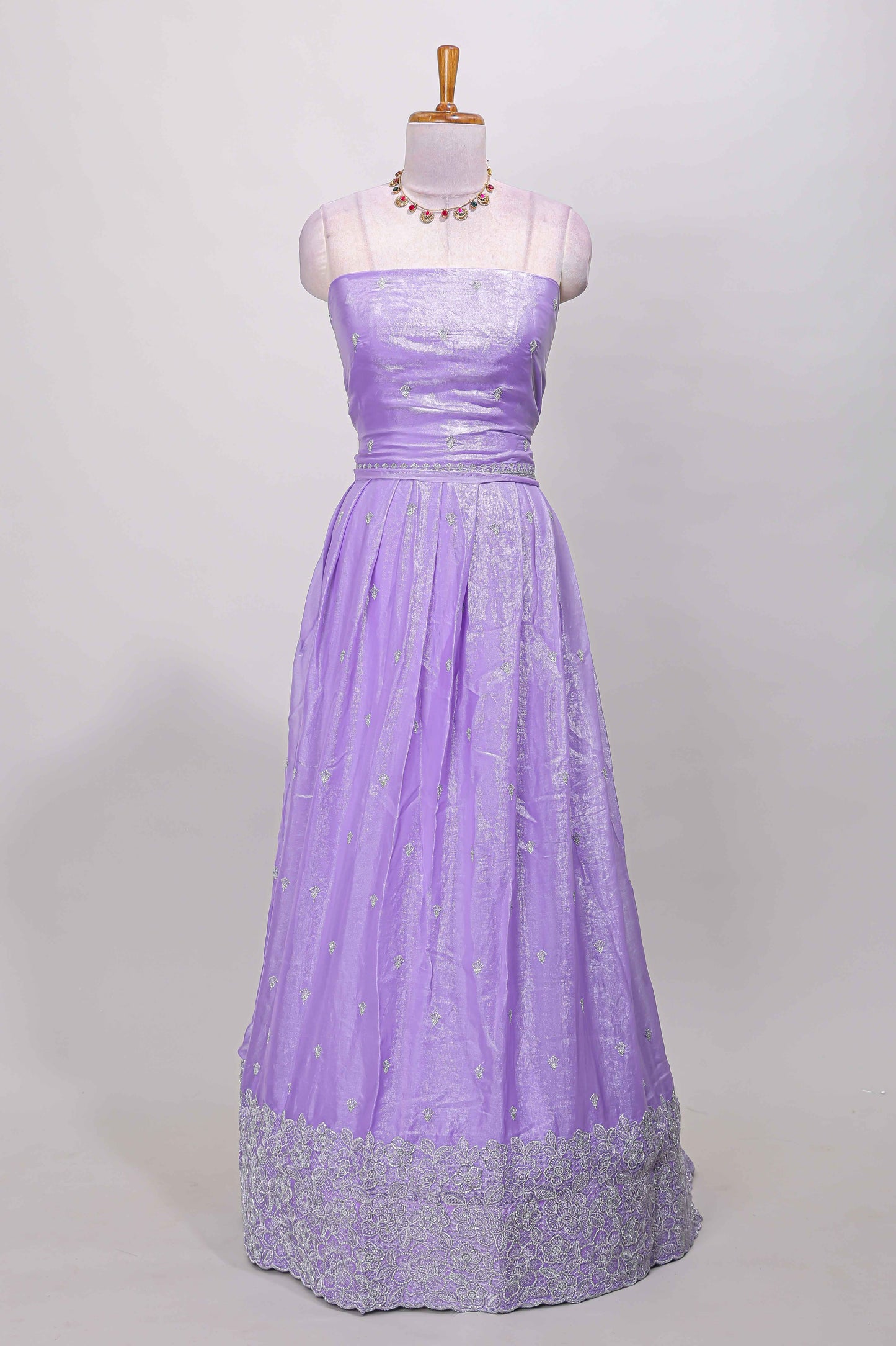 Lavender fendy chiffon lehenga with all over embroidery and stone work, paired with a contrast dhavani