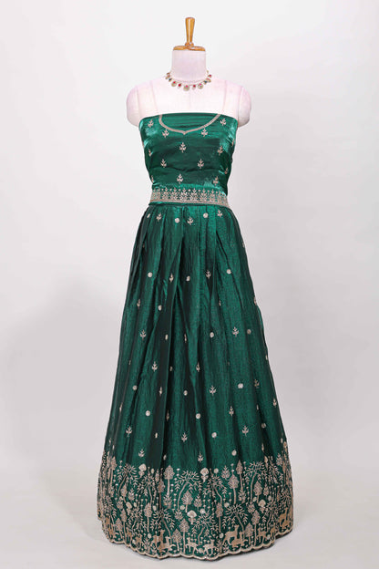 Green fendy chiffon lehenga with all over embroidery and stone work, paired with a contrast dhavani