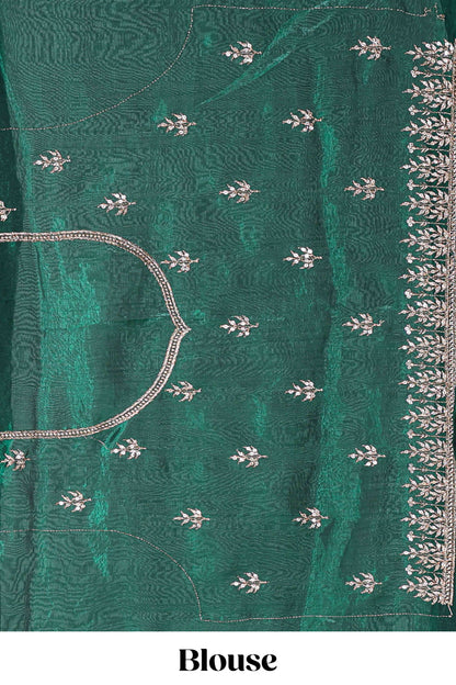 Green fendy chiffon lehenga with all over embroidery and stone work, paired with a contrast dhavani