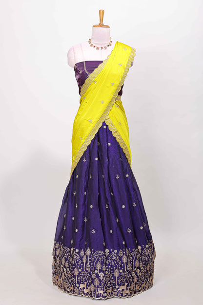 Violet fendy chiffon lehenga with all over embroidery and stone work, paired with a contrast dhavani