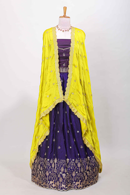 Violet fendy chiffon lehenga with all over embroidery and stone work, paired with a contrast dhavani