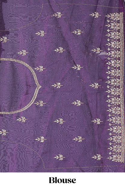 Violet fendy chiffon lehenga with all over embroidery and stone work, paired with a contrast dhavani