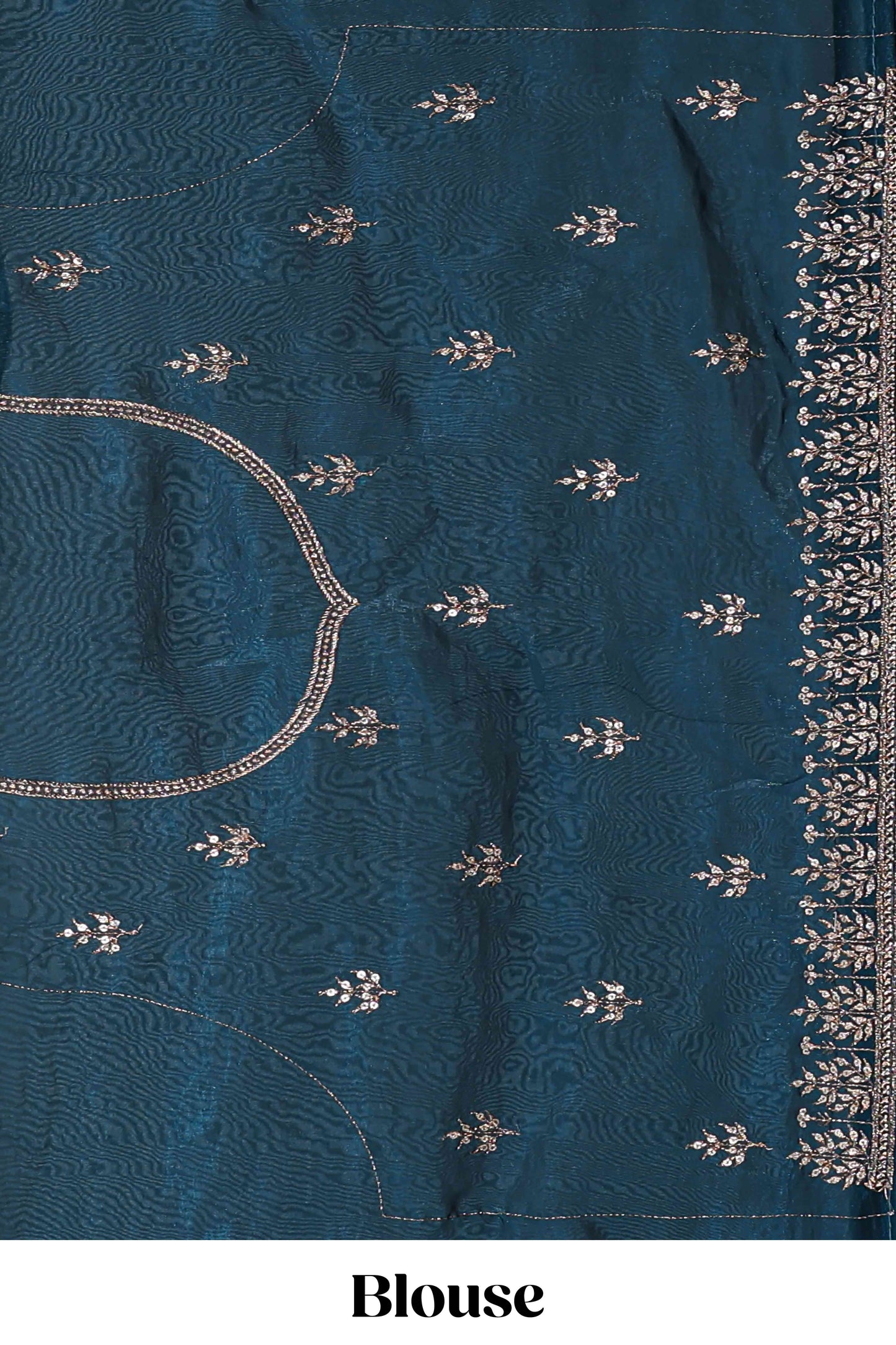 Peacock blue fendy chiffon lehenga with all over embroidery and stone work, paired with a contrast dhavani