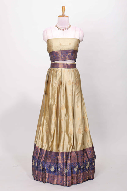 Golden raw silk zari butta lehenga with blue contrast border and dhavani