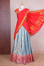 Sky blue jacquard floral zari design half saree with contrast zari border and dhavani