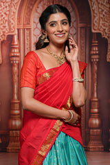Turquoise blue floral zari design half saree with contrast zari border and dhavani