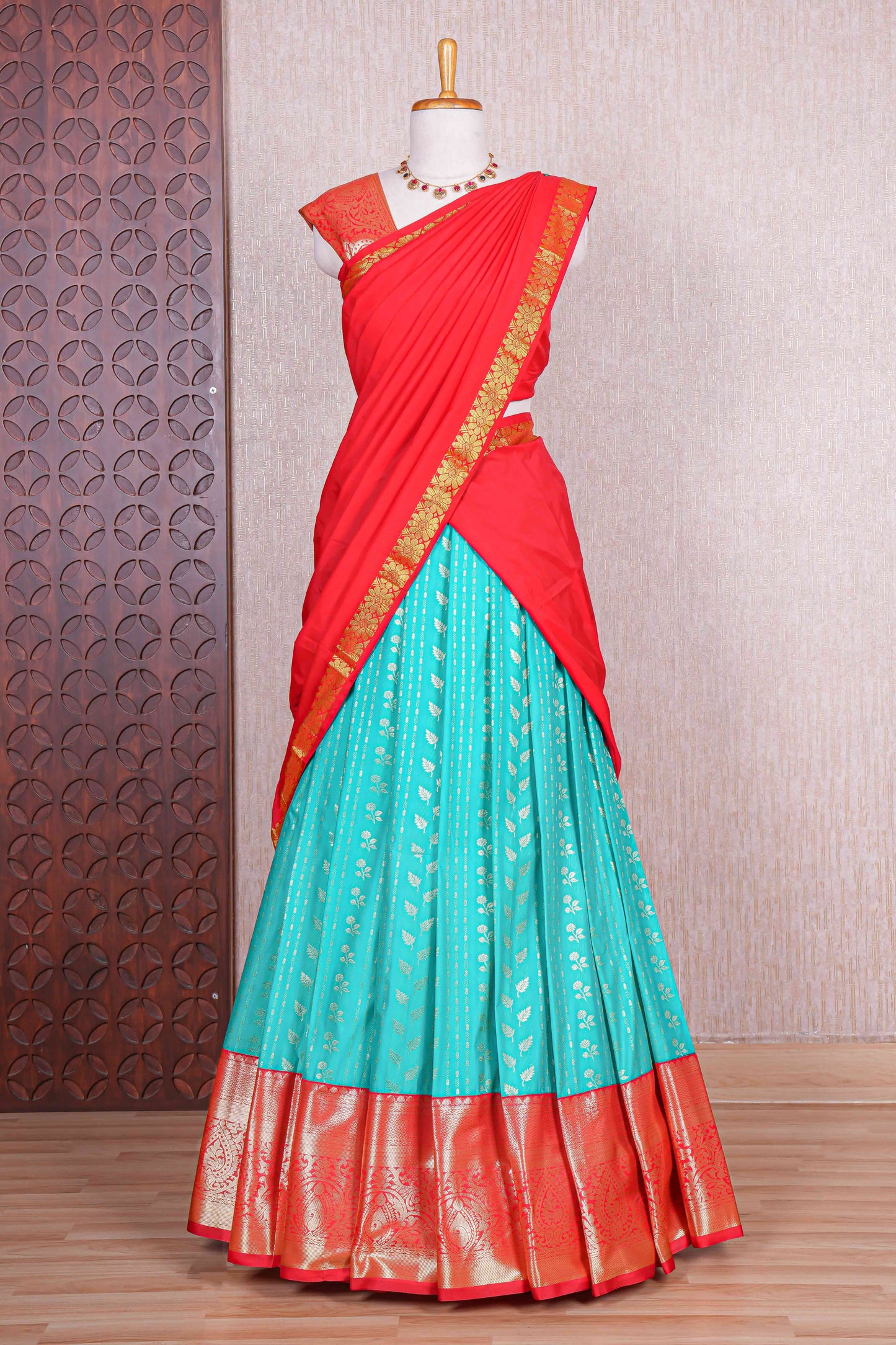 Turquoise blue floral zari design half saree with contrast zari border and dhavani