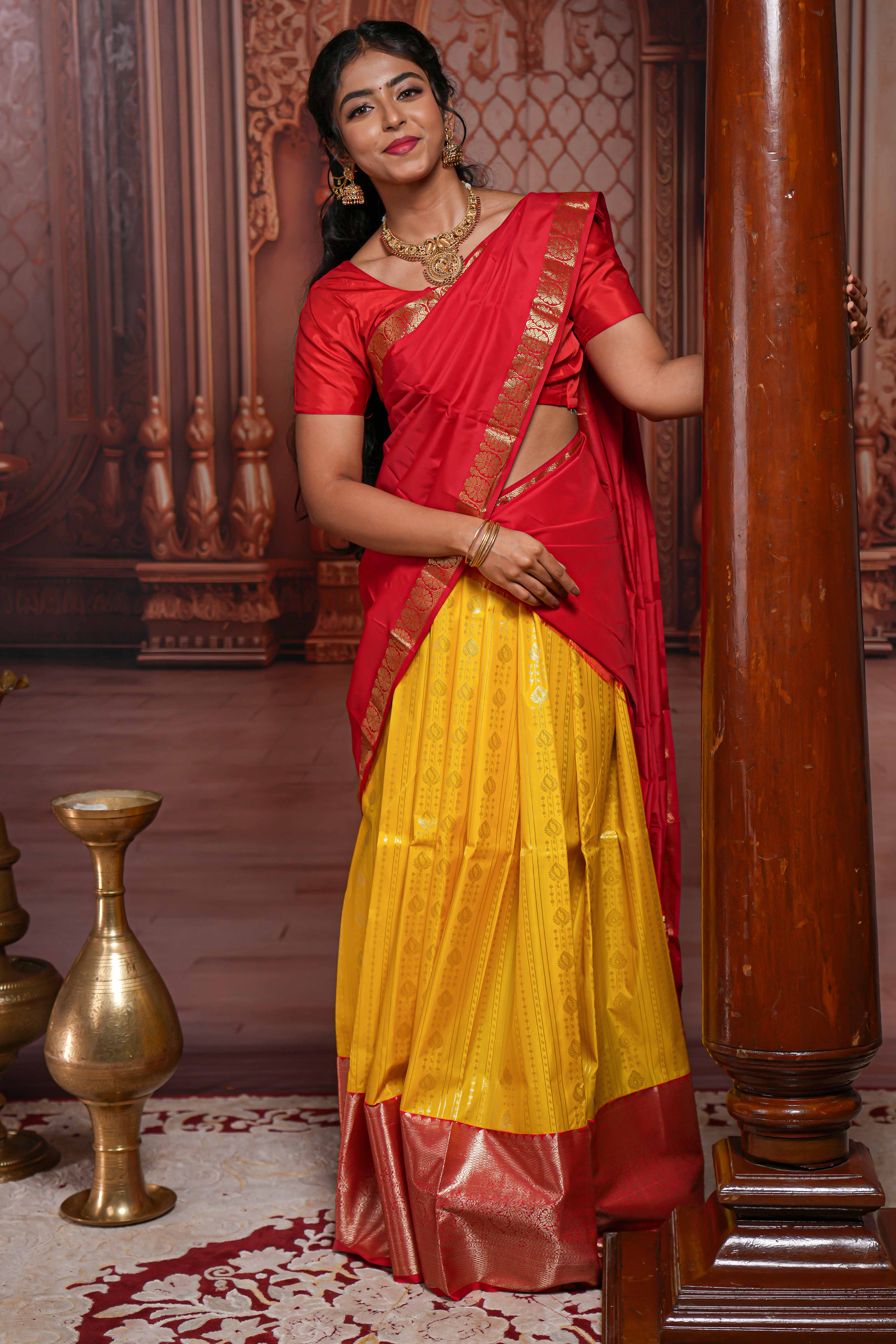 Yellow striped zari butta design half saree with contrast zari border and dhavani