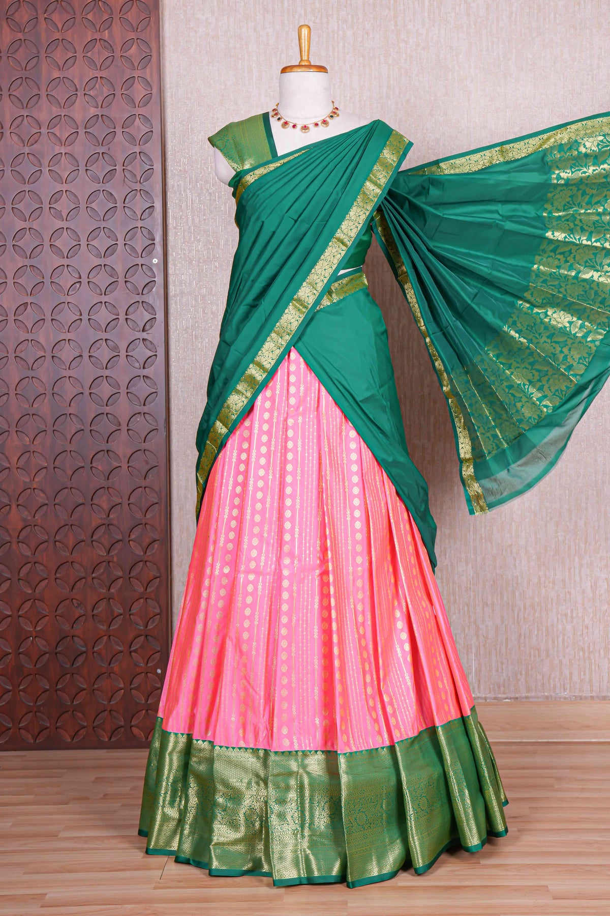 Pink striped zari design half saree with contrast zari border and dhavani