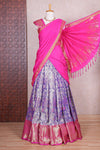 Lavender jacquard floral zari design half saree with contrast zari border and dhavani