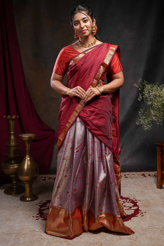 Pastel lavender jacquard floral zari design half saree with contrast zari border and dhavani