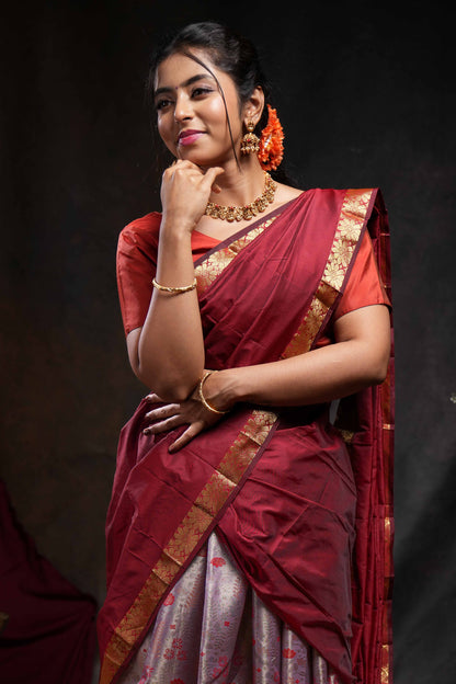 Pastel lavender jacquard floral zari design half saree with contrast zari border and dhavani