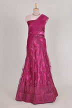 Rose colour net lehenga featuring delicate embroidery with a borderless design paired with a matching self shawl