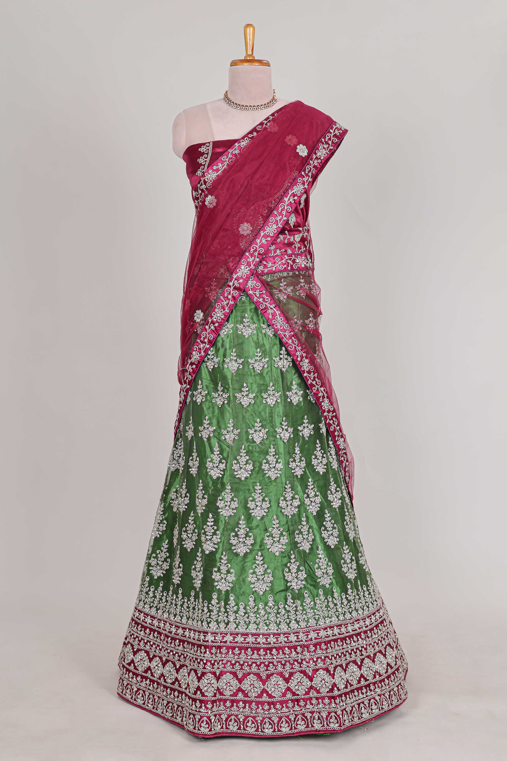 Beautiful net lehenga with intricate embroidery stone work and contrast border paired with a contrast net shawl