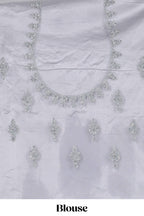 Silver colour net lehenga featuring delicate embroidery stone work with a borderless design paired with a matching self shawl