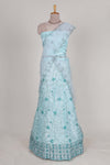 powder blue net lehenga featuring delicate embroidery with a borderless design paired with a matching self shawl