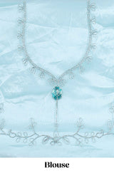 powder blue net lehenga featuring delicate embroidery with a borderless design paired with a matching self shawl