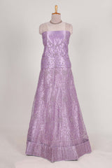 Lavender net lehenga featuring delicate embroidery with a borderless design paired with a matching self shawl