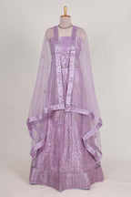 Lavender net lehenga featuring delicate embroidery with a borderless design paired with a matching self shawl