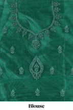 Bottle Green net lehenga featuring delicate embroidery with a borderless design paired with a matching self shawl