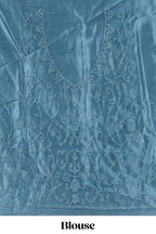Blue colour net lehenga featuring delicate embroidery with a borderless design paired with a matching self shawl