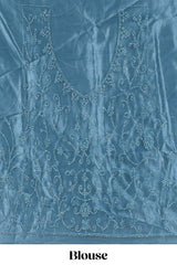 Blue colour net lehenga featuring delicate embroidery with a borderless design paired with a matching self shawl