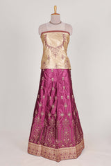 Beautiful satinlehenga adorned with intricate embroidery Paired with a contrast chiffon shawl