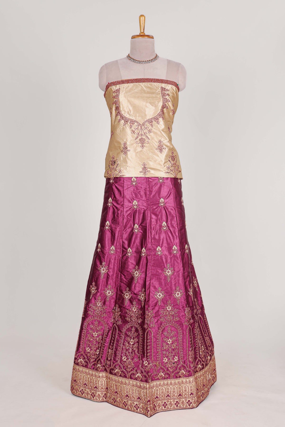 Beautiful satin  lehenga adorned with intricate embroidery Paired with a contrast chiffon shawl