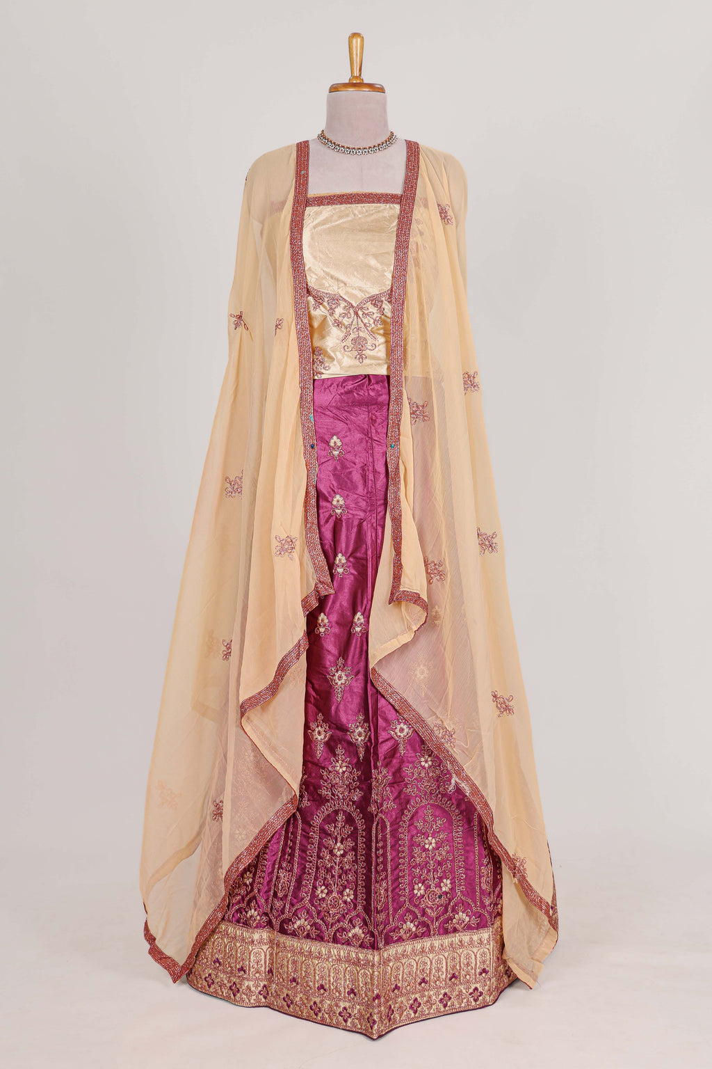Beautiful satin  lehenga adorned with intricate embroidery Paired with a contrast chiffon shawl