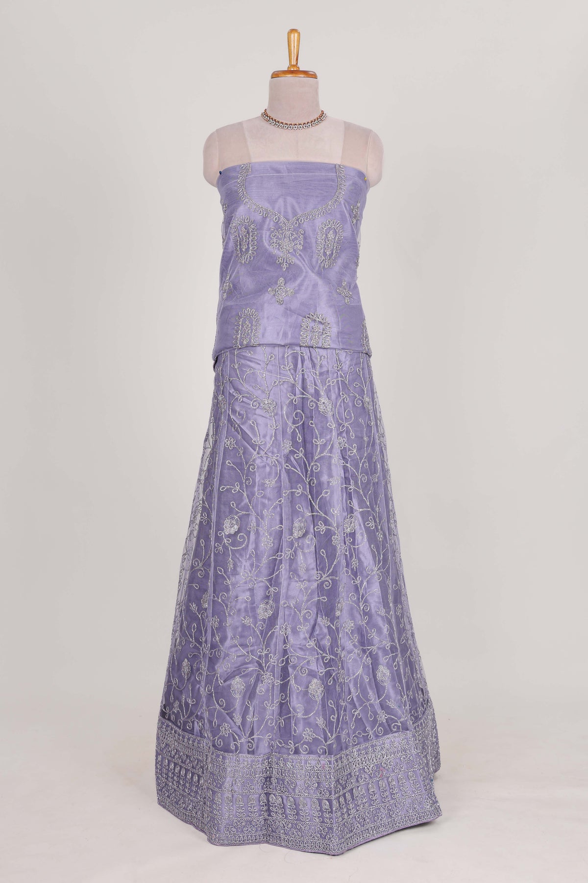 Lavender net lehenga  with embroidery work and Paired with a matching net shawl