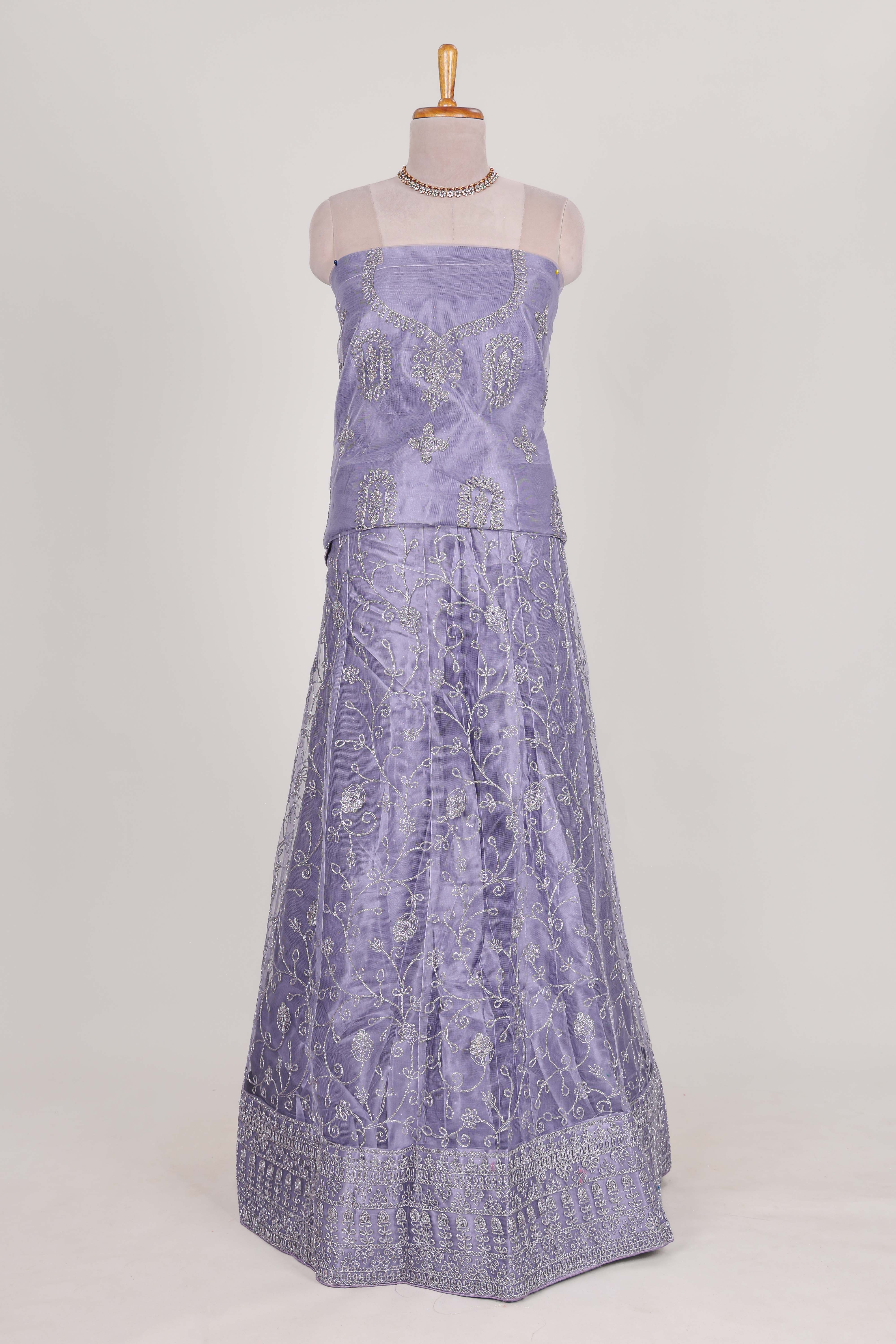 Lavender net lehengawith embroidery work and Paired with a matching net shawl