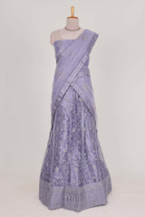Lavender net lehengawith embroidery work and Paired with a matching net shawl
