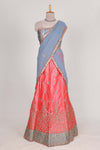 Bright pink satin lehenga embroidery with a beautiful contrast border paired with a matching embroidered blouse
