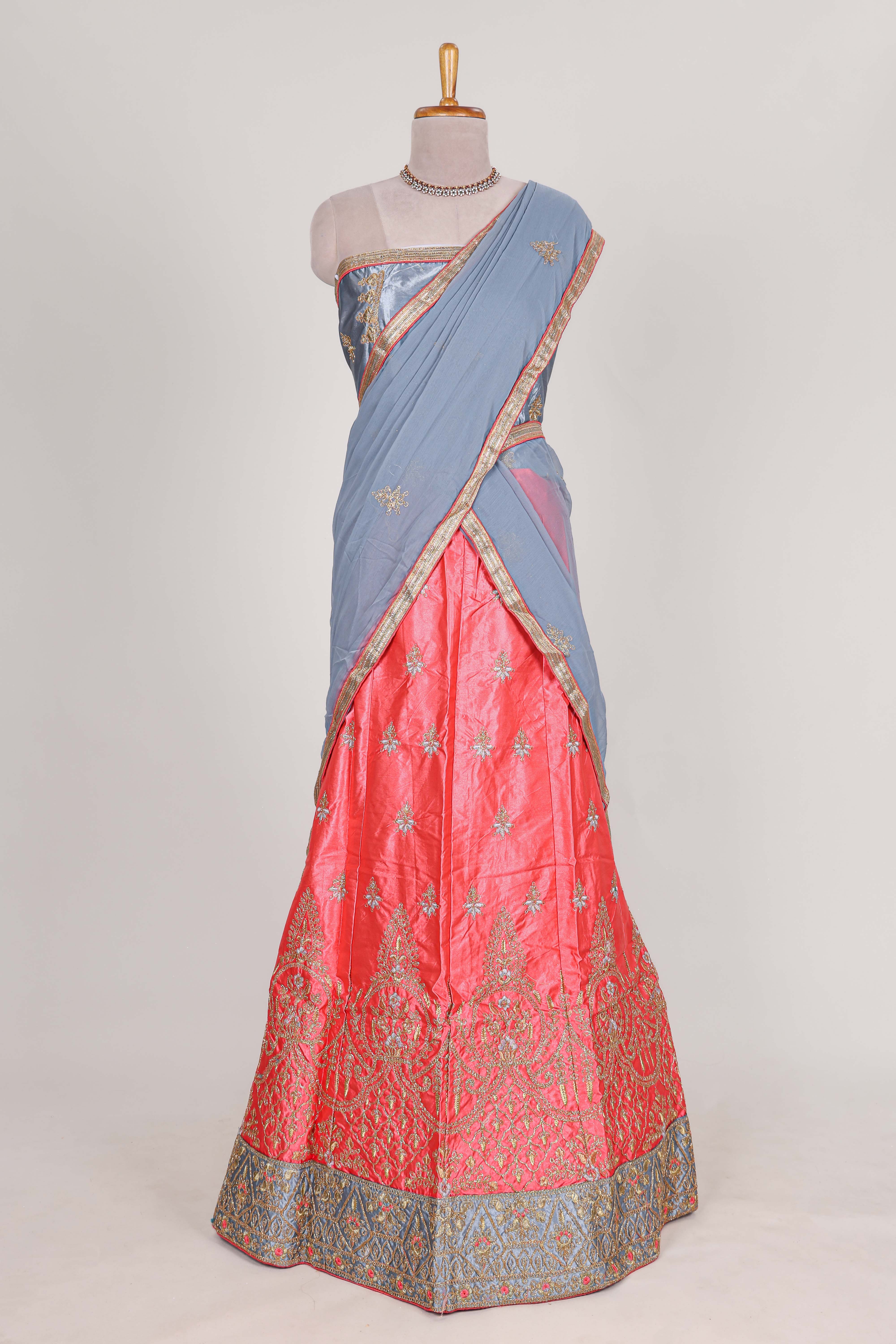 Bright pink satin lehenga embroidery with a beautiful contrast border paired with a matching embroidered blouse